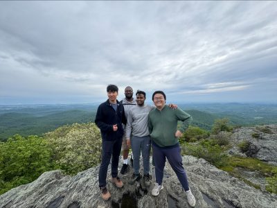student on top of the mountain