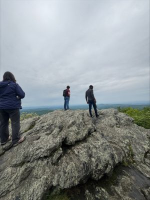 student on top of the mountain