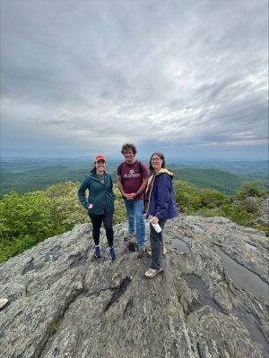 student on top of the mountain