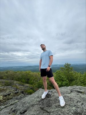 student on top of the mountain
